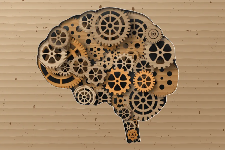 Mental-Health-Clinic Cardboard-cut illustration of a human brain made of gears. Schedule mental health treatment from Sandra McDonald, NP in Southwestern Ontario.